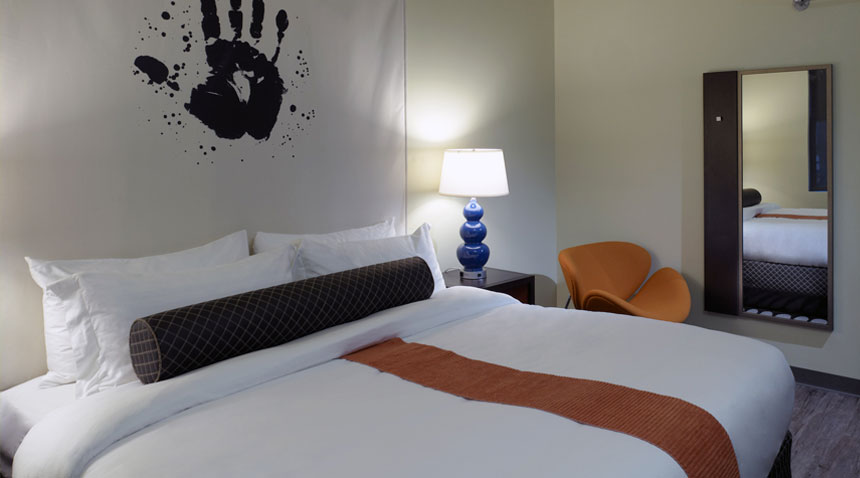 acme-hotel-company-illinois-king-suite-bedroom